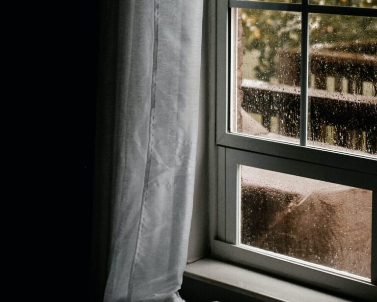 image of a window suggesting weatherization