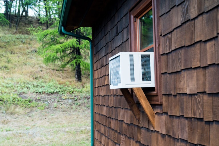 a window air conditioning unit on a cabin